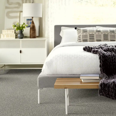 Soft bedroom carpet installation in Dallas TX home with modern neutral design